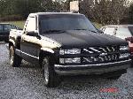 My truck w/billet, lights, and new hood, old pic.